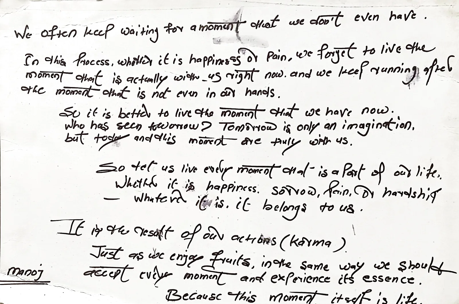 A note handwritten by Yogi Manoj of Mimamsa Yogshala on living in the present moment and karma